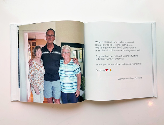 An open Diovi keepsake book: a photo of three friends beside a handwritten thank-you message